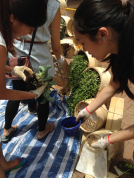 Students planting at their installation on site